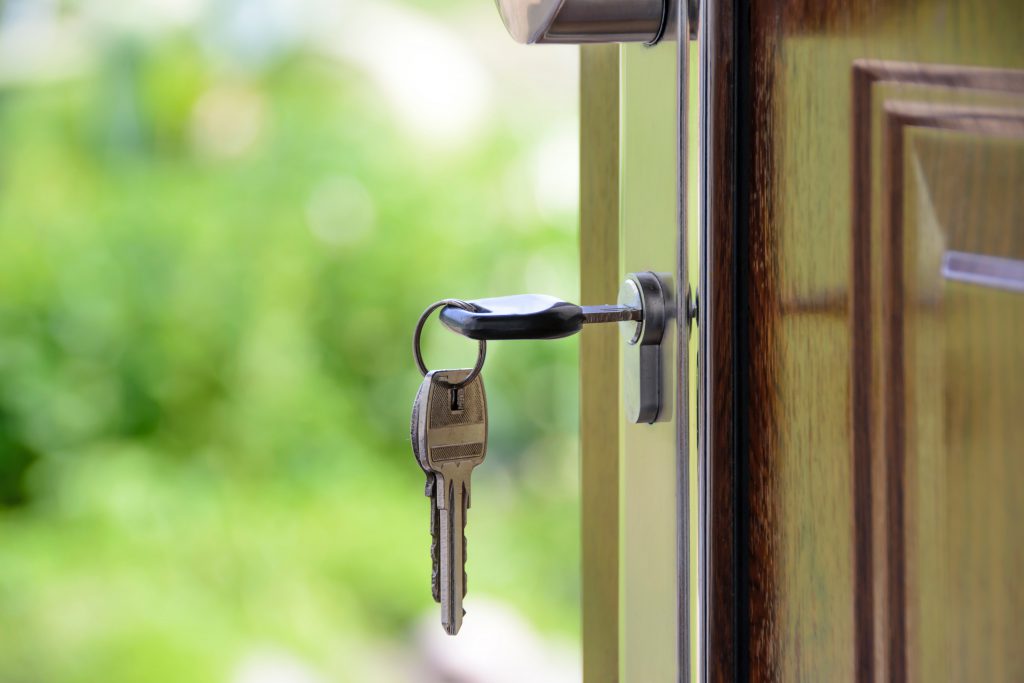real estate investor key in door