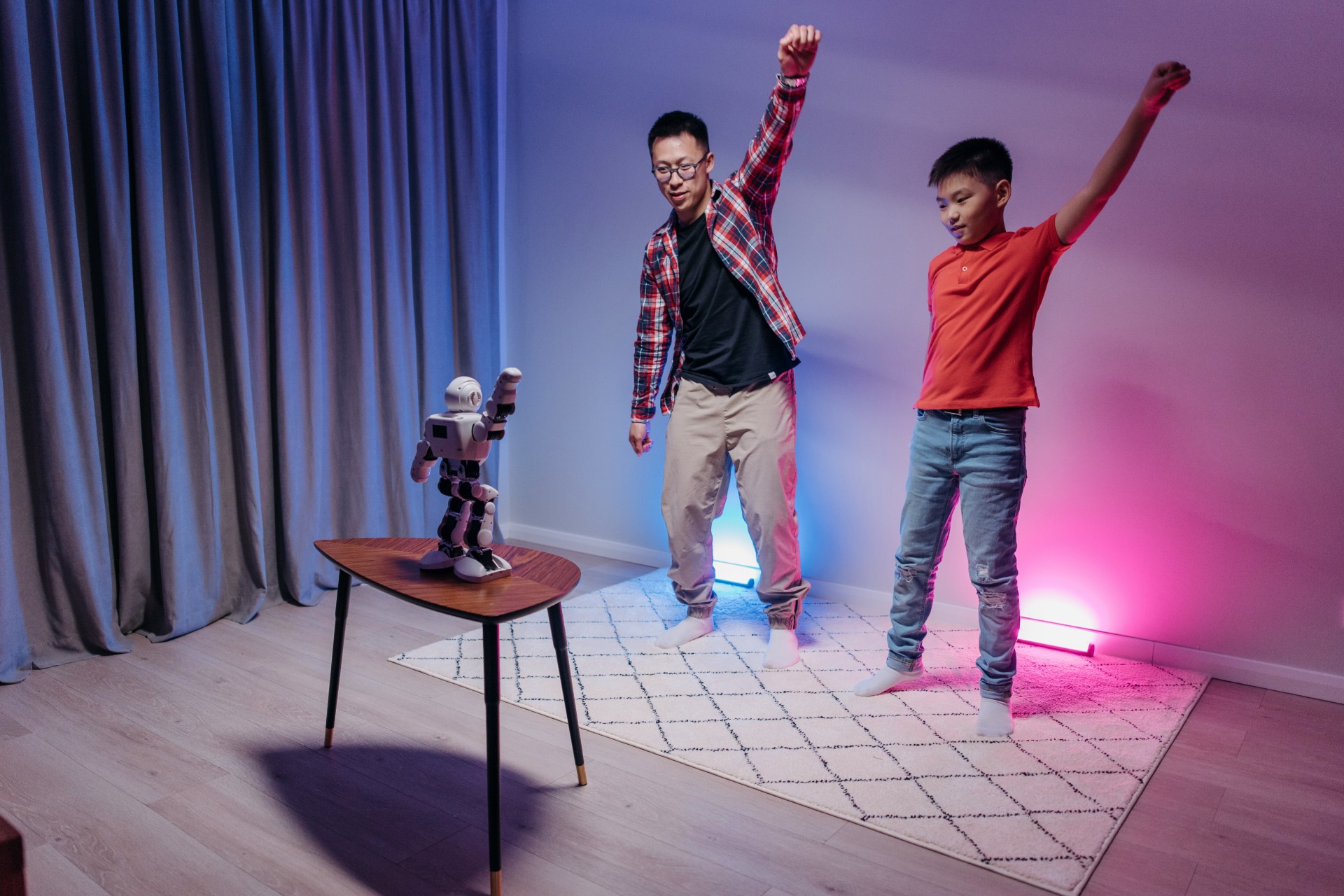 Dancing robots mimic human-like choreographic dancing and move in replication of the manually programmed, often-complicated actions.