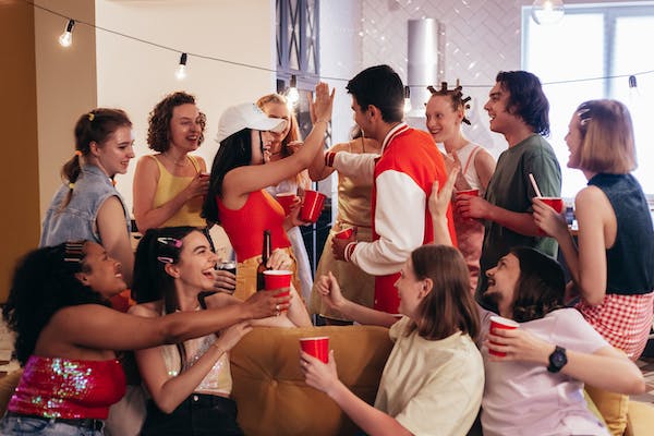 young people at a party laughing